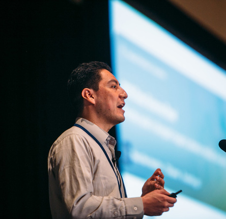 Juan Caicedo, a Schmidt fellow, presents the Broad Retreat