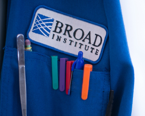 Broad Institute logo on a lab coat