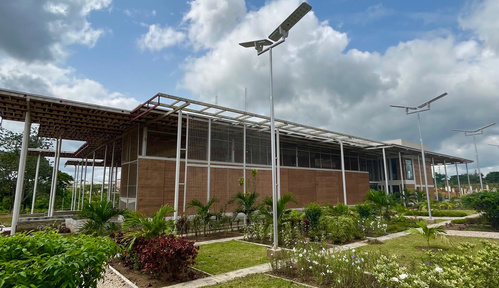 Exterior of the ACEGID center, showing the building and surrounding landscaping.
