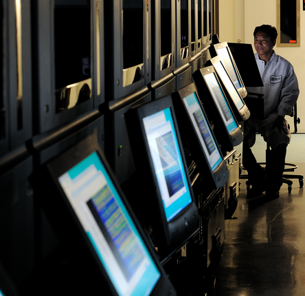 A line of sequencers at the  Genomics Platform