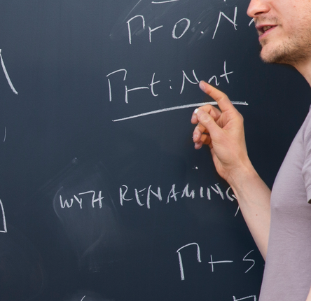Math equations on a black board