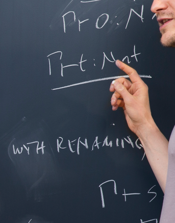 Math equations on a black board
